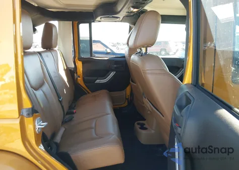 2014 Jeep Wrangler Unlimited Sahara z USA, uszkodzony, nr VIN 1C4BJWEG2EL168646